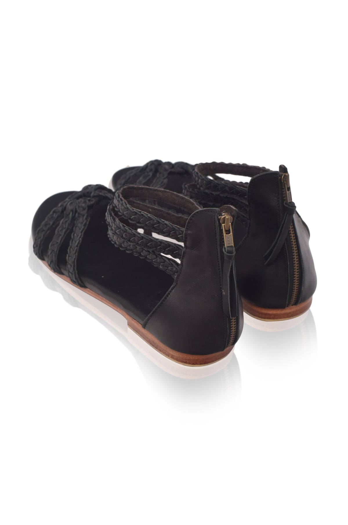 Black braided leather sandals, braided strap detail, on a white background — handmade by Bali ELF