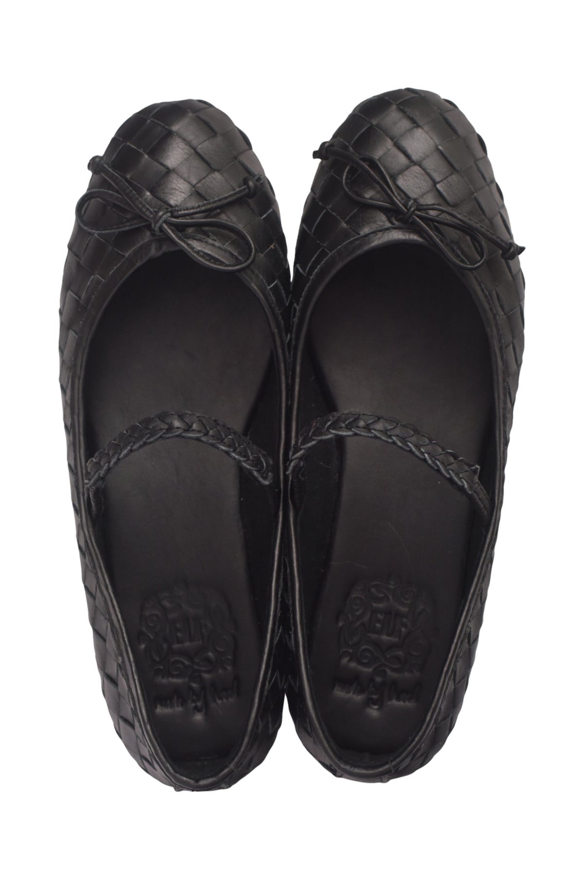 A pair of black woven leather ballet flats with braided straps, shown from a top-down view on a white background.