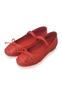 A pair of red woven leather ballet flats with Mary Jane straps and bow details, displayed on a clean white background.