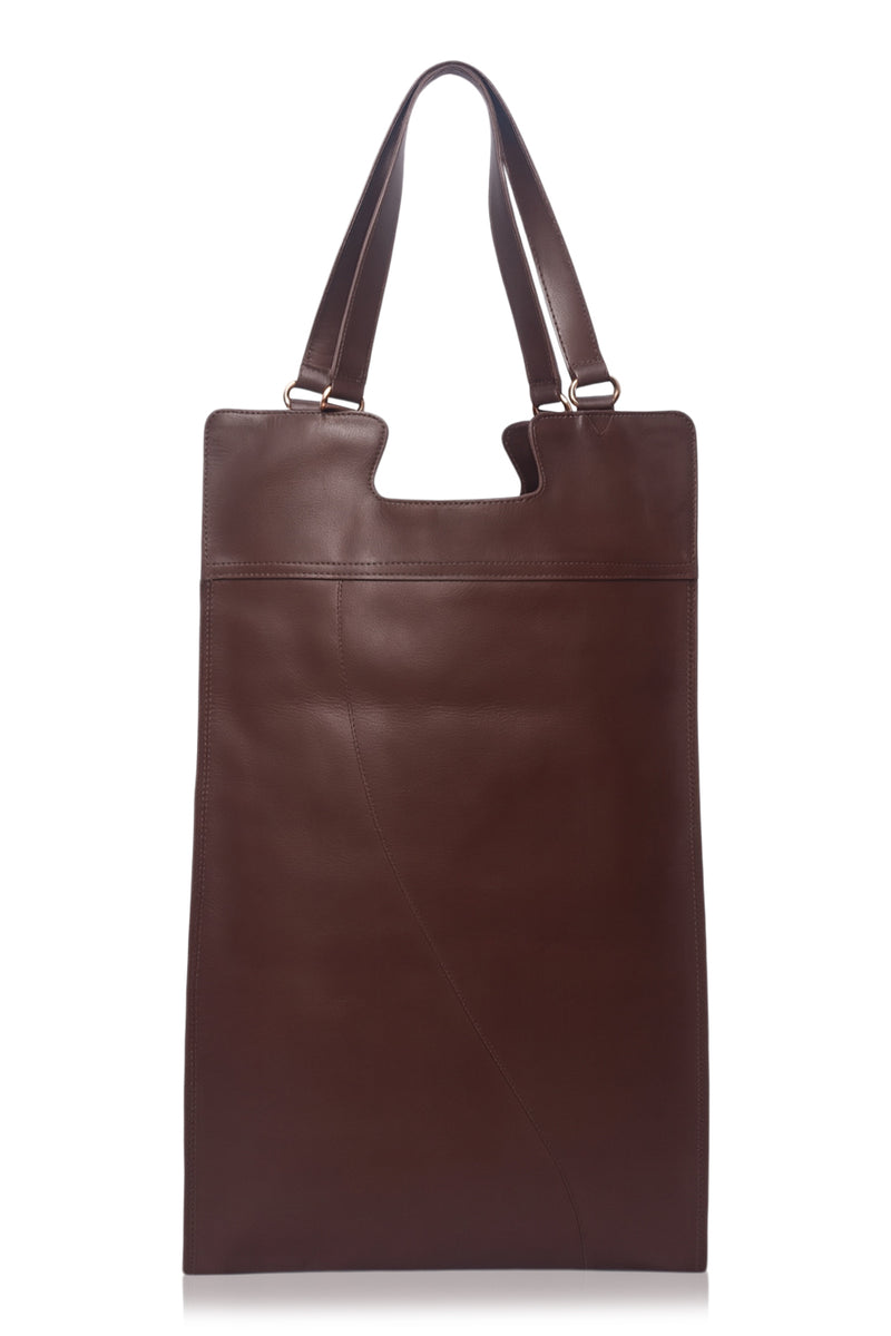 Brown leather tote bag on a white background
