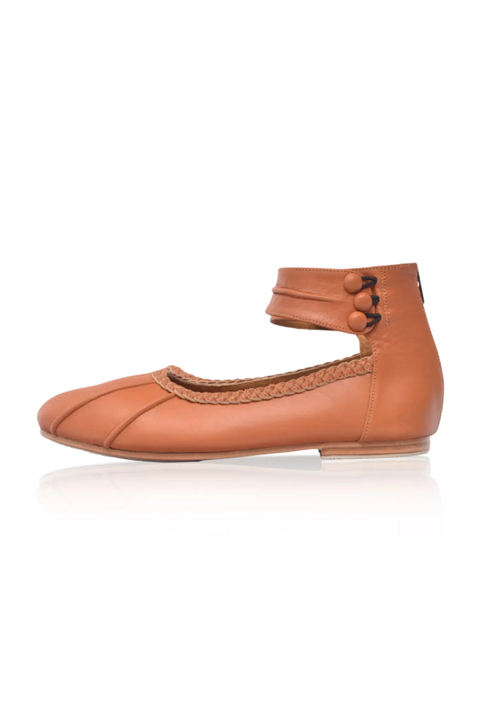 Dark tan ankle-strap leather ballet flats, side view — handmade by Bali ELF