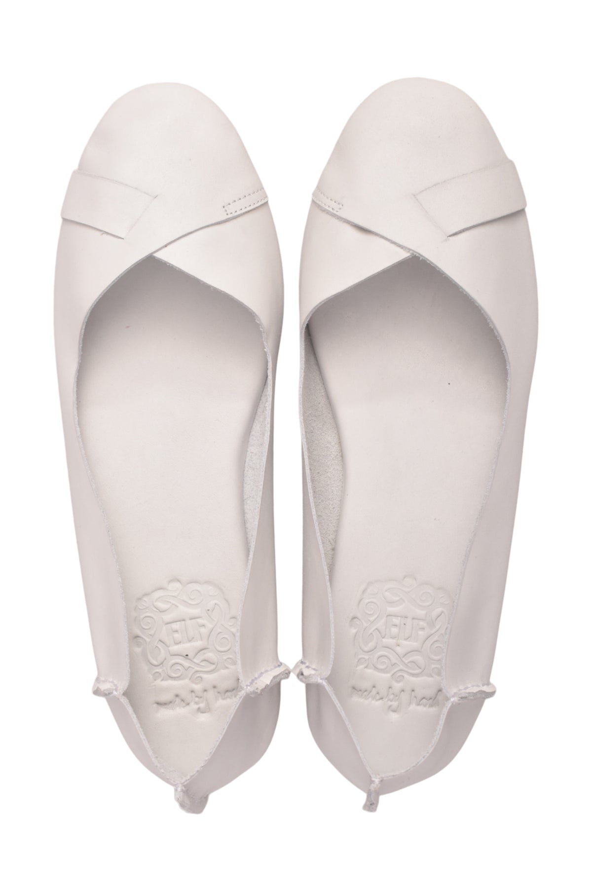 A pair of white leather ballet flats shown from a top-down view on a plain white background.