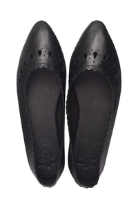 A pair of black leather pointed-toe flats with decorative cutout detailing on the vamp, shown from a top-down view on a white background.
