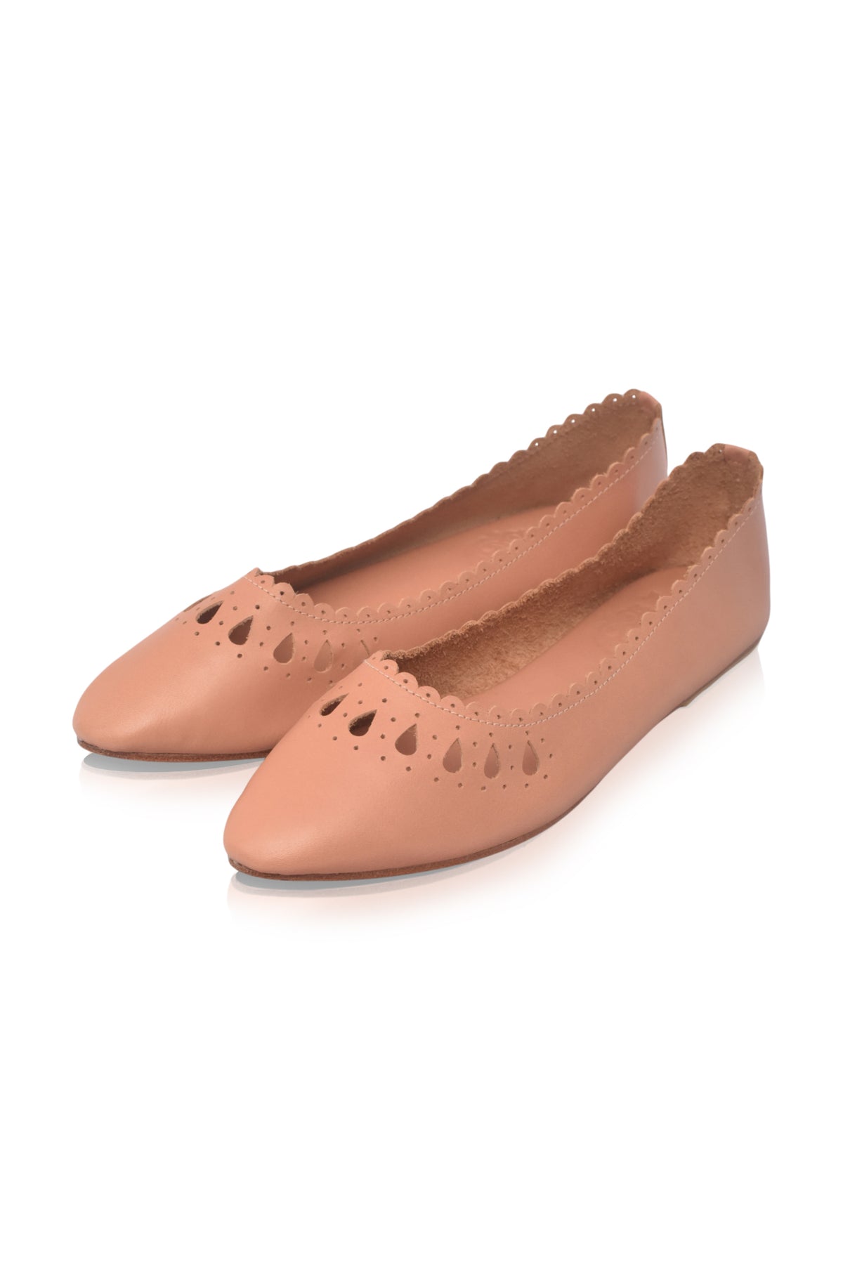 A pair of women's pointed-toe flats in a warm tan leather, featuring decorative laser-cut details on the toe and a scalloped edge at the heel, shown on a white background.
