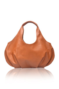 Brown leather handbag on a white background